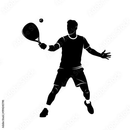 Silhouette of a male tennis player hitting a ball during a match