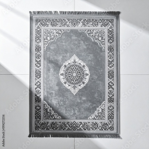 Intricate rug on tiled floor : An overhead view captures the intricate patterns and designs of a detailed rug laid out on a tiled surface, emphasizing texture and form. 