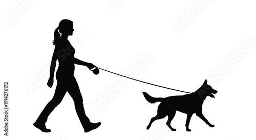 A silhouette of a woman walking a dog on a leash