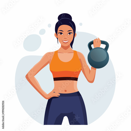Fit woman in sportswear holding a kettlebell with a smile