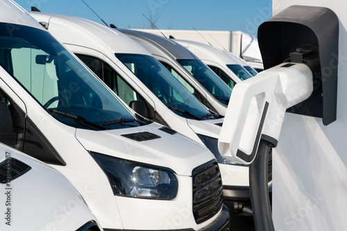 Wallpaper Mural Electric delivery vans with electric vehicles charging station Torontodigital.ca