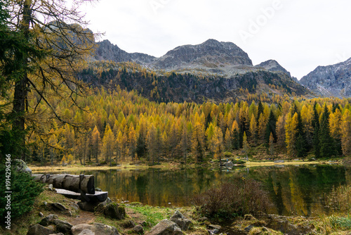 Tableau sur toile San Pellegrino lake next to the San Pellegrino pass a high mountain pass in the Italian Dolomites in autumn
