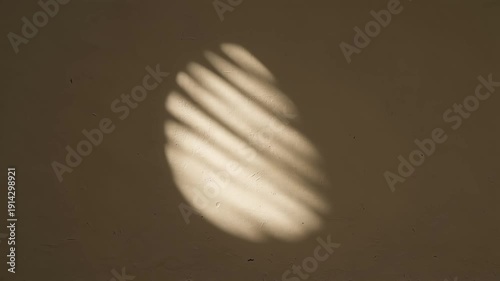 A close-up view of a spinning object with a blurred, swirling pattern against a dark background.