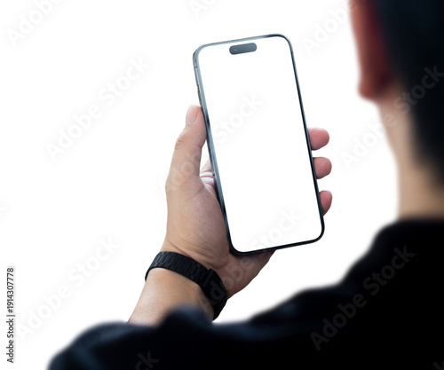 Over the shoulder view of a hand holding smartphone with transparent PNG screen and isolated background, user experience and interface concept