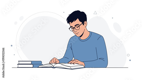 Young man wearing glasses reading book at desk, study, education, knowledge concept