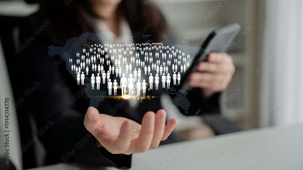 Fototapeta premium Businessperson using smartphone to connect with diverse people in virtual network, symbolizing communication, technology, and digital interaction in modern world Quark.