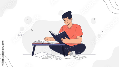 Young man sitting cross-legged reading a book, studying, learning, knowledge