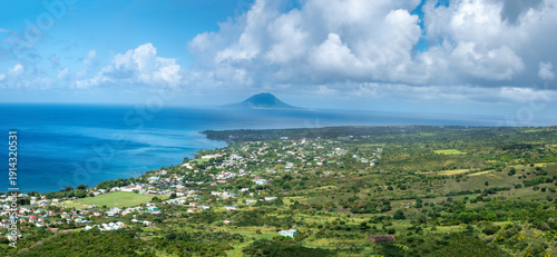 Panoramic view of Saint Kitts island from the top of Brimstone Fortress National Park, Saint Kitts and Nevis. The dutch island of St. Eustatius in the background