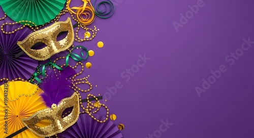 Mardi gras masks and decorations in purple and gold