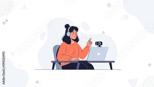 Woman with headphones learning online, pointing at laptop screen with webcam