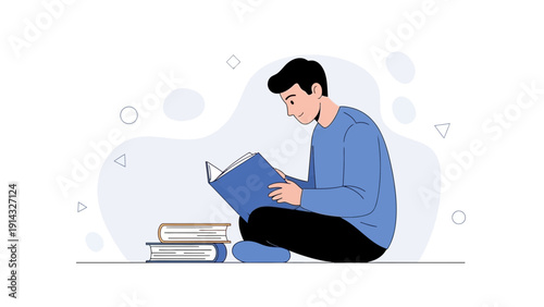 Young Man Reading Book Sitting Cross-legged With Stacked Books