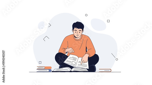 Young man sitting cross-legged, reading an open book, surrounded by other books.