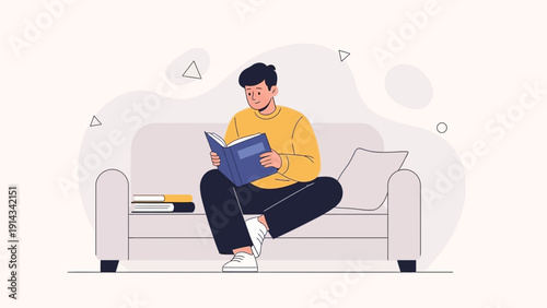 Young Man Reading a Book on a Sofa, Cozy Home Interior, Relaxing Lifestyle