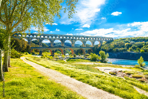 Canvas Print The Pont du Gard ancient Roman aqueduct from first century and the river of Gard