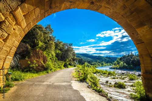 Fotografie The arch of Pont du Gard ancient Roman aqueduct over the river of Gardon view