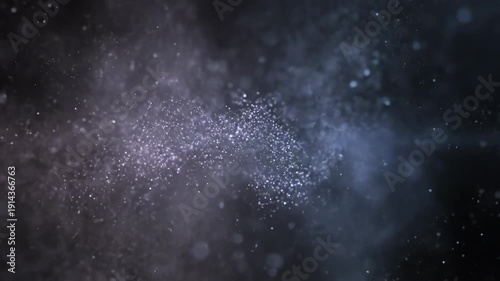 Sparkling dust particles drift through a dark, ethereal space. Gentle light illuminates the cosmic dance of tiny specks.