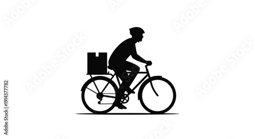 A cyclist with a package rides a bicycle dark silhouette