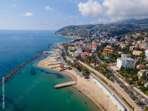 Sanremo aerial view at sunny day, beautiful Italian Riviera coastline with beach, turquoise sea and city architecture in Liguria, Italy
