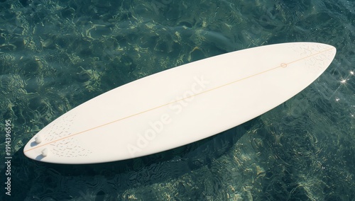 Surfboard Floating on Clear Water at a Beach During Daylight Hours