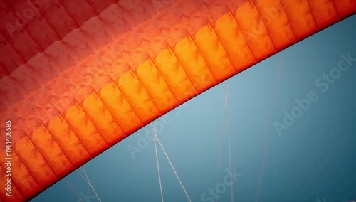 Colorful Canopy Above a Sky During a Paragliding Experience in a Sunny Afternoon