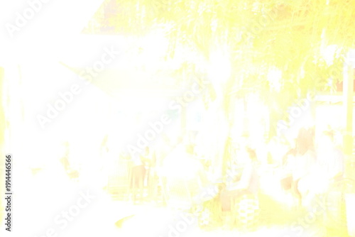 Blurry city scene with people walking on sunny day