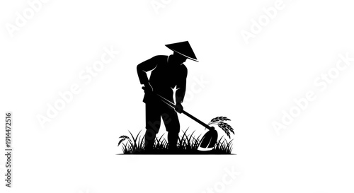 Silhouette of a farmer planting rice with a sickle in a field