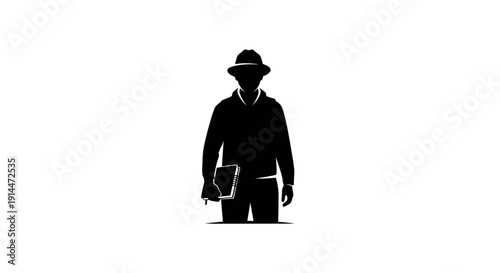 Silhouette of a person wearing a hat and holding a tablet