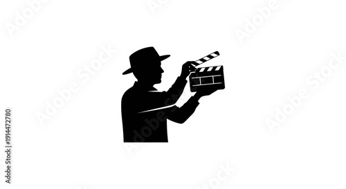 Silhouette of a filmmaker with clapperboard