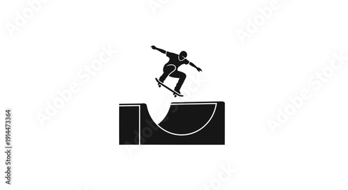 Skateboarder Performing Trick on Ramp in Silhouette