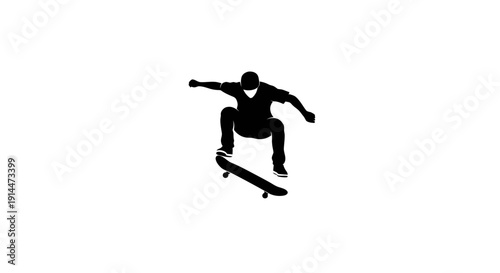 Silhouette of a Skateboarder Performing an Air Trick