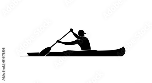 Silhouette of a person kayaking on calm water