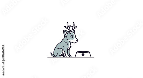 Deer sitting next to computer.