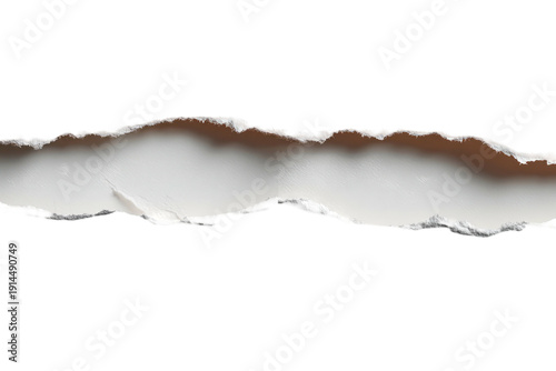 A detailed view of a torn, white paper strip revealing the inner texture against a stark black background