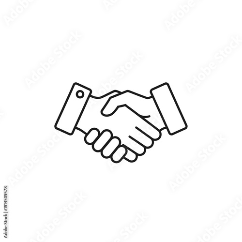 Professional Handshake Between Two Individuals Symbolizing Agreement and Cooperation