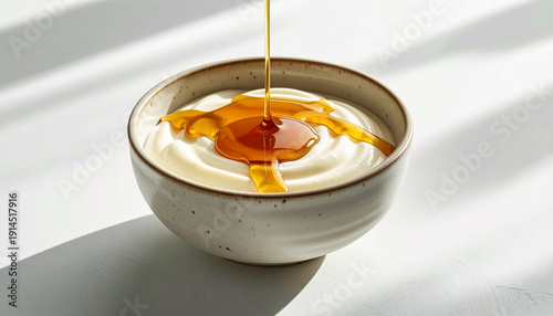 Yogurt bowl with maple syrup drizzle