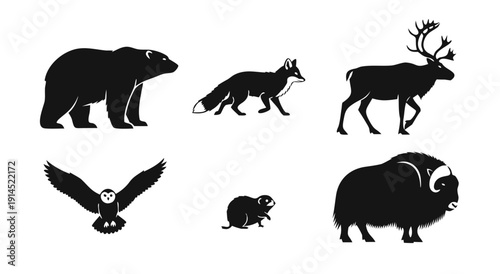 Black and white silhouette illustration of a collection of arctic animals including a polar bear arctic fox reindeer snowy owl lemming and muskox