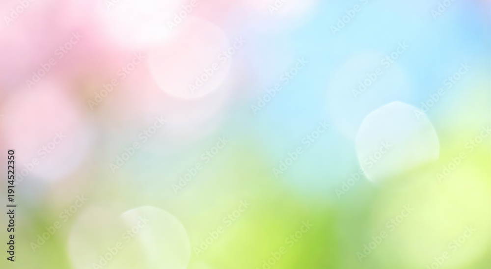 Obraz premium Blurred natural background with soft bokeh lights and pastel colors