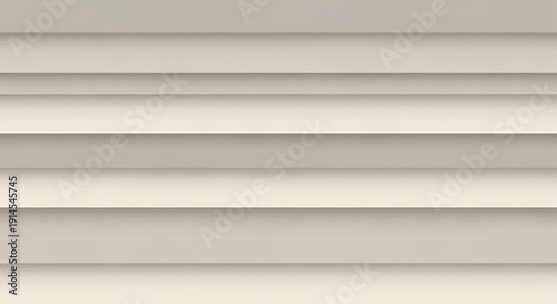 Close-up view of light-colored horizontal siding with a ribbed texture, creating a pattern of shadows and highlights on a building exterior.