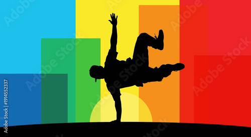 Man performing breakdancing action in front of a colorful graphic background viewed from side