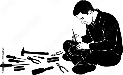 Man sitting on floor repairing shoe with tools around him in silhouette style isolated on white background
