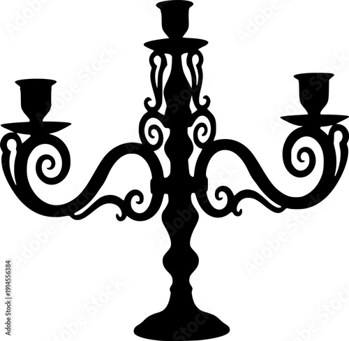 Black silhouette of a three-armed candelabra with curly metalwork isolated on white background
