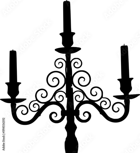 Black silhouette of a three-armed candelabra with curly metalwork isolated on white background
