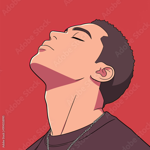 A young man takes a moment to look up with a confident expression against a bright red background. His neck is extended, and he has a chain on.