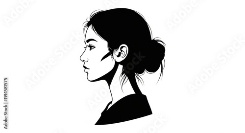 Profile Silhouette of a Young Asian Woman with Hair in a Bun.