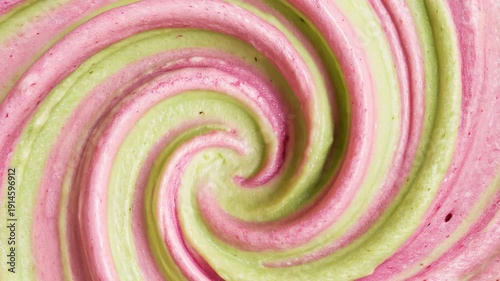 Video 4k green and pink matcha and strawberry juice, Abstract close-up of light green creamy texture swirled into a spiral pattern. thick cosmetic body care or herbal substance background