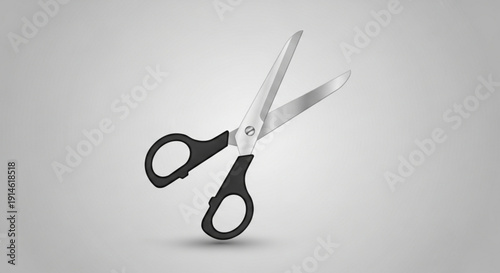 Open scissors with black handles and silver blades on a gray gradient background