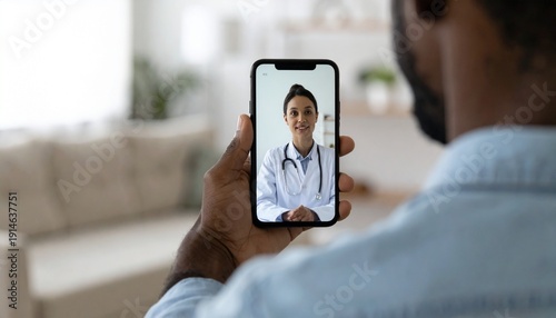 Man having a virtual doctor visit on smartphone. Telehealth consultation with smiling female physician online.