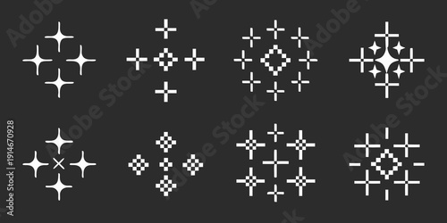 Collection of pixelated sparkle and starburst icons on a black background