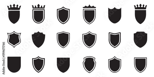 Collection of shield emblems with crowns and intricate borders on white background vector