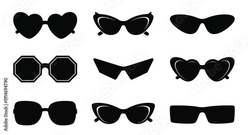 Beautiful aerial view of a calm turquoise mountain lake surrounded by dense green pine forests under a clear blue sky during bright summer day